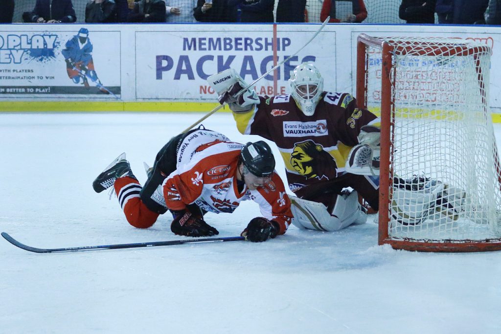 Tom Soar tumbles into the Warriors crease (Steve Crampton)