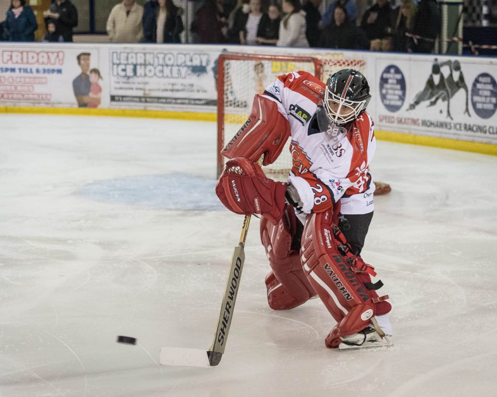 Josh Nicholls comes well out of his crease to clear the puck (Harish Chavda, www.dingleimages.com)