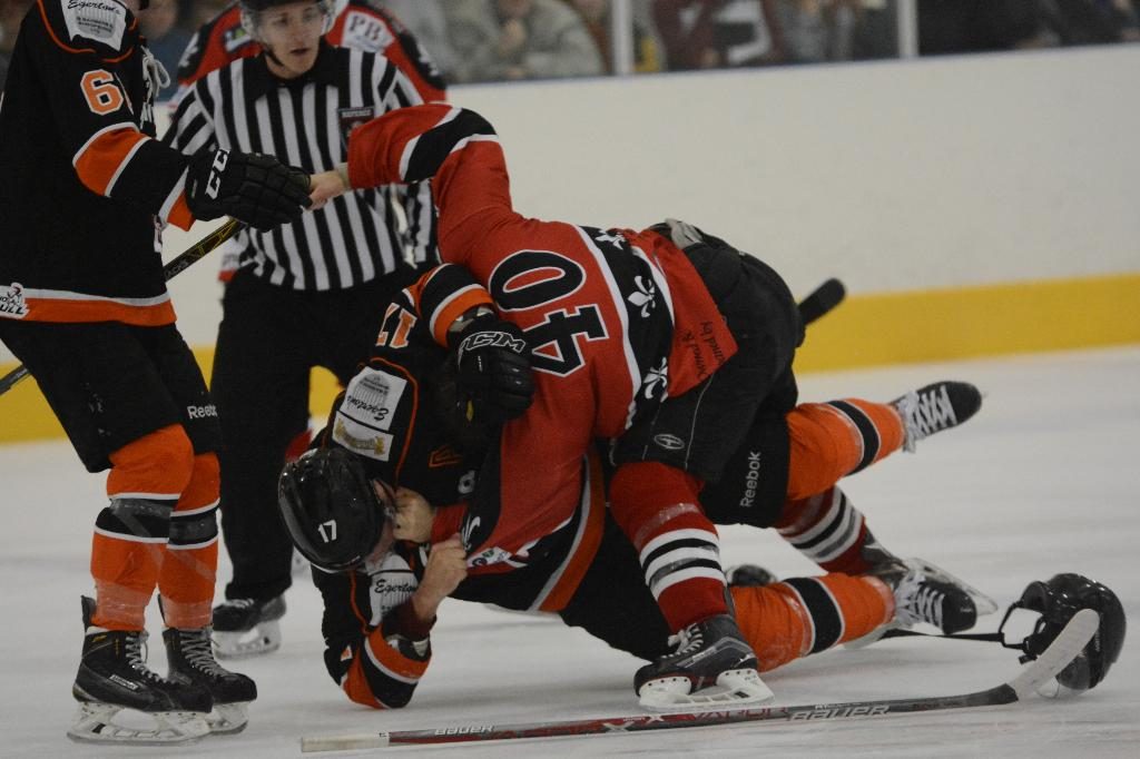 Josh Bruce and Richard Plant clash in the final 5 minutes of the game (J&K Davies)