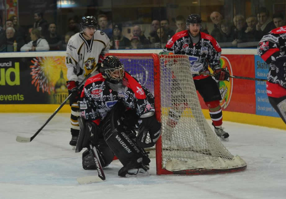 Josh Nicholls & Tomas Janak defend against the Lions in March 2015 (J&K Davies)