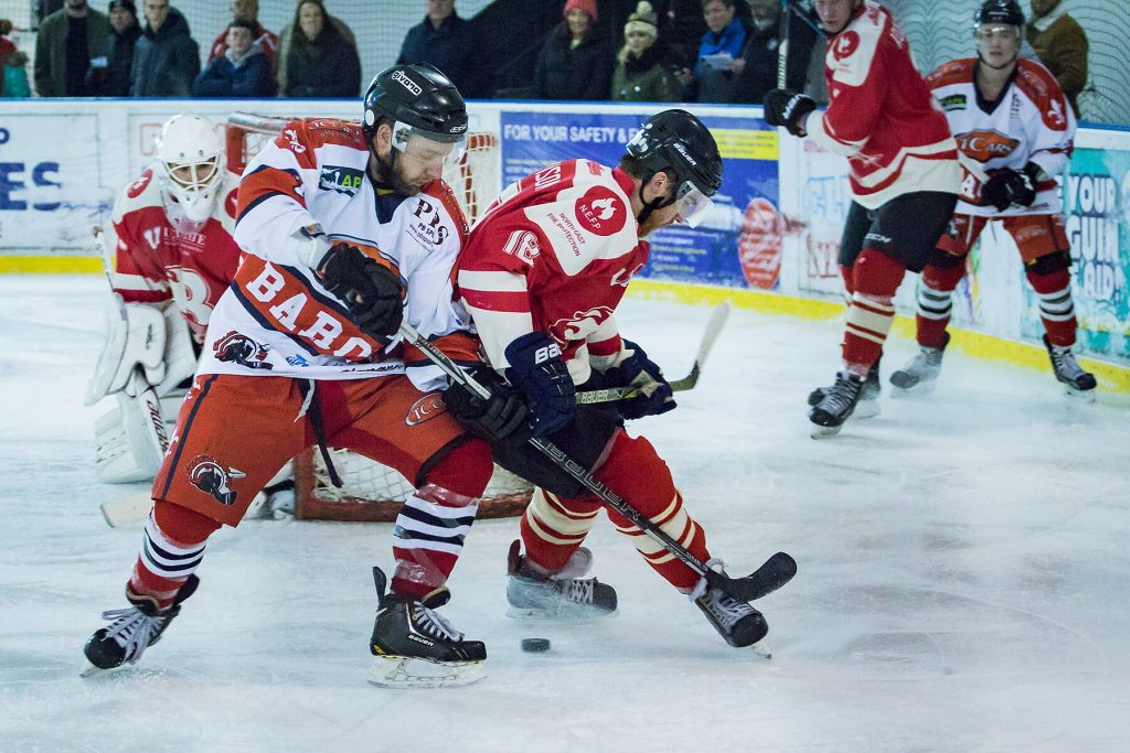 Adam Brittle battles for the puck (Steve Crampton)